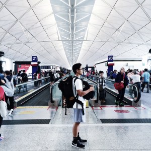 David with his backpacks in Hong Kong airport 